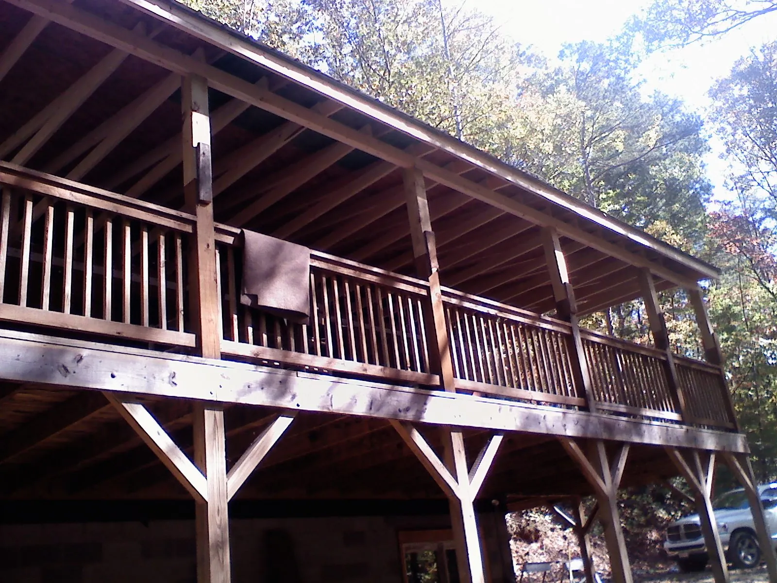 Timber framing under a new elevated porch and deck — Roof Leak Repair in Wapakoneta by Roofing Brothers